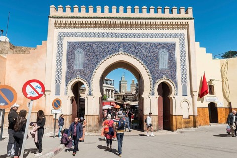 Locals and tourists in front of Bab Boujeloud