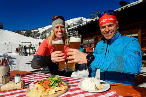 Olympic silver medal winner Tobi Angerer with his wife Romy at the snack on the Wildalm