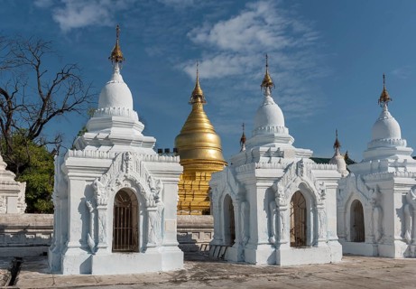 White kyauk gu cave stupas at Kuthodaw Pagoda