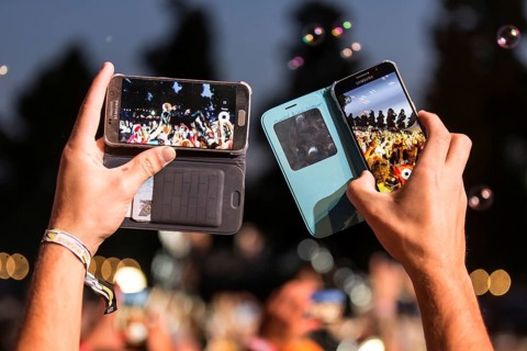 Festival visitor takes photos with Iphone from the British band Skunk Anansie and singer Deborah Anne Dyer alias Skin live at the 26th Heitere Open Air in Zofingen