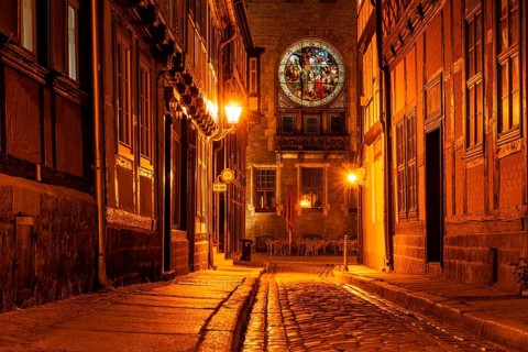 Narrow alley with half-timbered houses