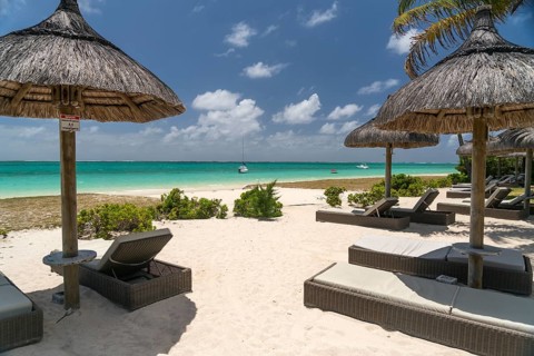 Deck chairs on the beach of Pointe d'Esny