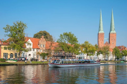 Historical townscape on the river Trave with cathedral