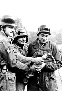 Firefighters with hose