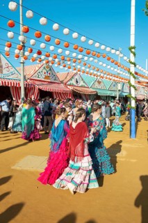 Spanish women wearing flamenco dresses