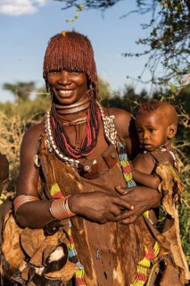 Woman with an infant in her arms