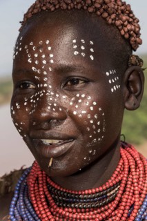Young woman with face painting