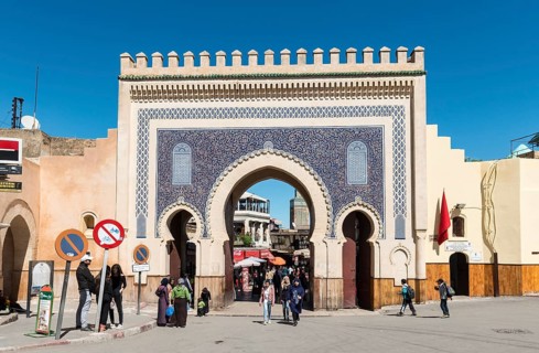 Locals and tourists in front of Bab Boujeloud