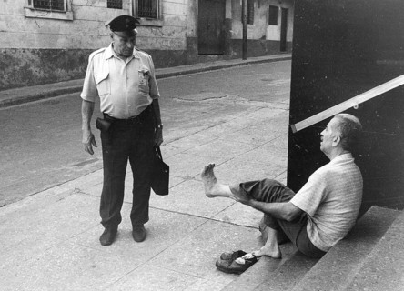 Man shows policeman his foot