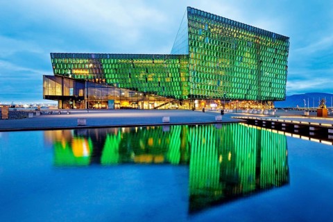 Illuminated Harpa Concert Hall at dusk