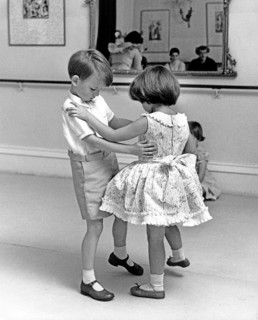 Two children dancing