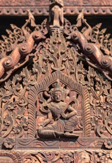 Teak-wood carvings at Nat Taung Kyaung
