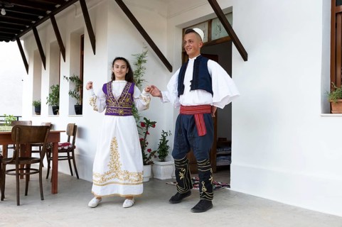 Local folkloric group in traditional costume demonstrating national Albanian dance