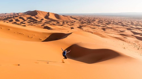 Woman running downhill