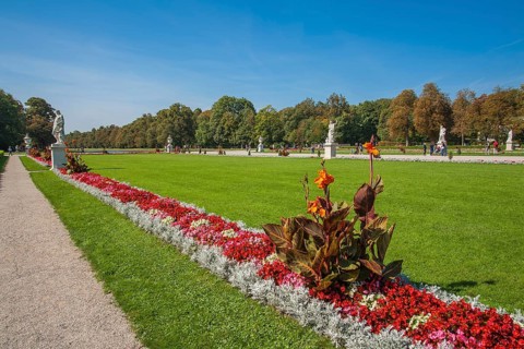 Park with flowerbeds and statues