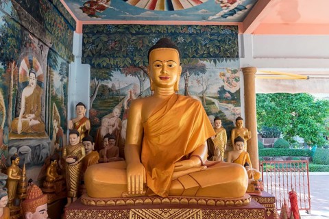 Seated Buddha statue at Wat Preah Prohm Rath temple