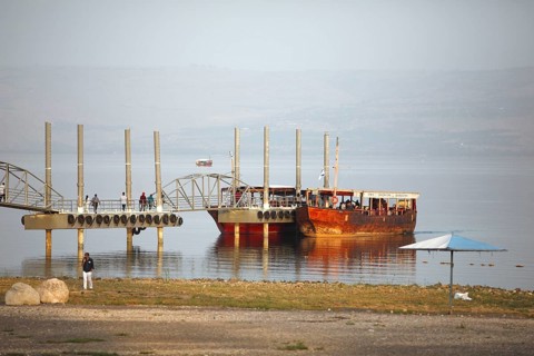 Jetty with boats for tourists on Lake Tiberias
