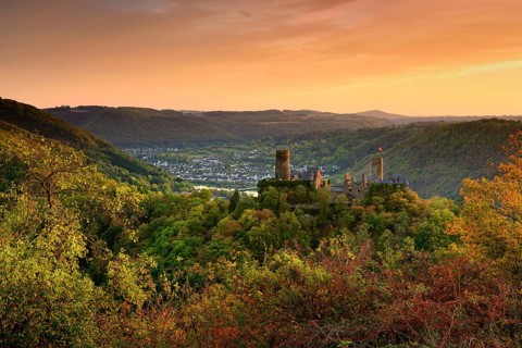View of Thurant Castle in the Moselle Valley at sunset in autumn