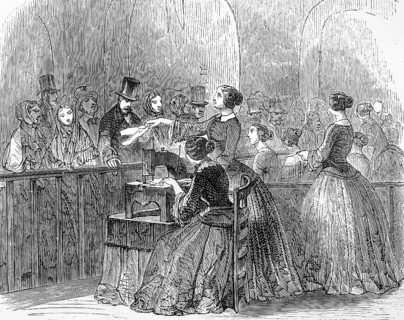 One woman sews on the sewing machine