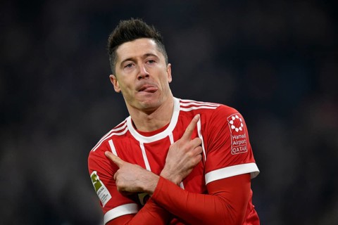 Typical celebration with crossed arms and tongue