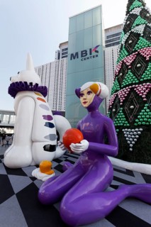 Sculptures of comic figures in front of the MBK Center