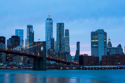 Brooklyn Bridge with skyline from Manhattan during blue hour