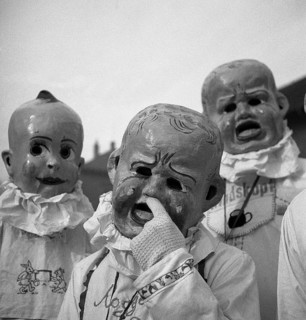 People with baby masks
