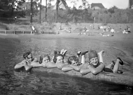 Four Women and a Man in a Swimming Pool