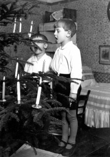 2 boys singing christmas tree