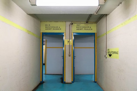 Entrance to the toilets and washrooms in the decommissioned nuclear bunker