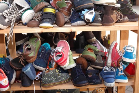 Children's shoes in a shelf