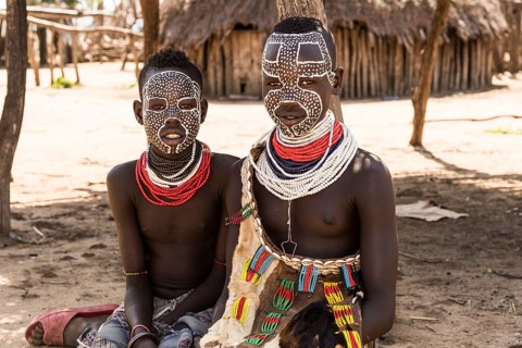 Two girls with traditional face painting