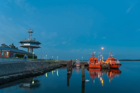 Pilot boats and control tower of the traffic control centre at the mouth of the Trave