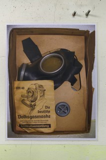 Poster of an instruction manual for the German Volksgasmaske from a civil air-raid shelter in World War II