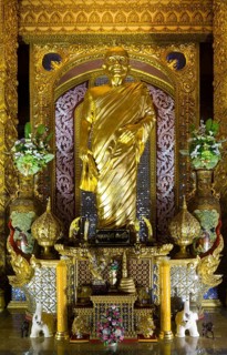 Golden Monk at Phra Maha Chedi Chai Mongkhon Pagoda