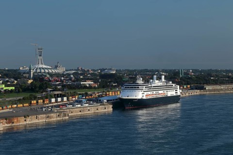 Cruise ship Rotterdam with Olympic Stadium behind