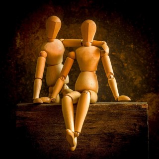Mannequins on a wooden box