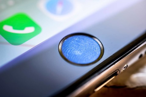 Close-up of Home button of the iPhone 6s with fingerprint on fingerprint sensor