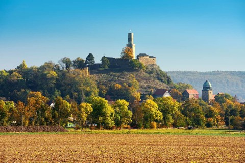Felsburg castle above the city of Felsberg in autumn