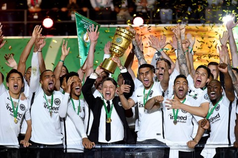 Cheering with coach Niko Kovact after the cup was handed over to Eintracht Frankfurt