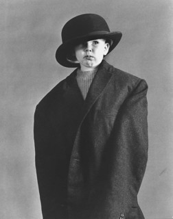 Little boy in large coat and hat