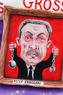 Turkish president Recep Tayyip Erdogan holds chains