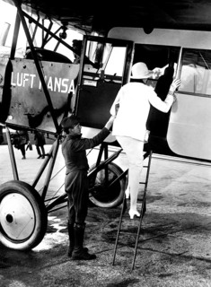 Woman boarding a Lufthansa passenger plane
