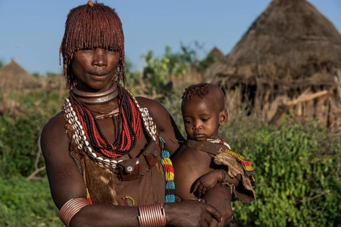Woman with an infant in her arms