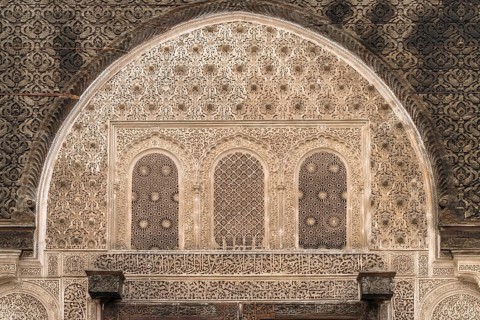 Artful carved decorations over a gate