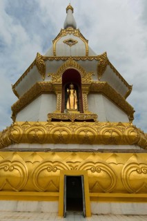Golden Buddha statue in the tower of the Phra Maha Chedi Chai Mongkhon Pagoda