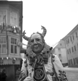 Man with mask on a parade