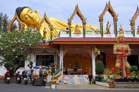 Lying golden Buddha in the temple Wat Sri Sunthon
