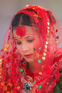 Nepalese bride from the Tharu ethnic group in traditional attire