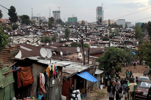 Slum with corrugated-iron huts on the outskirts